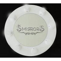 White circle shaped illuminated mirror